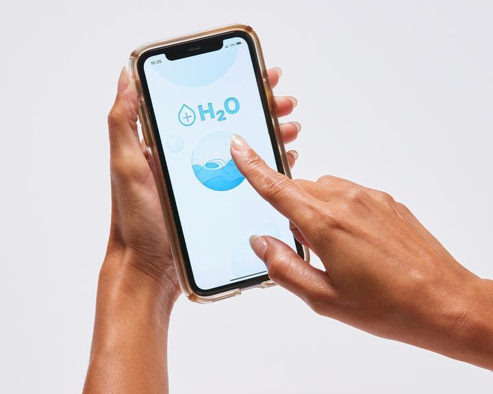 Person using their smart home mobile app to set their preferences